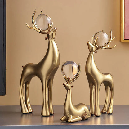 3-Piece Gold Resin Reindeer Sculpture Set – Christmas Deer Decor for Living Room