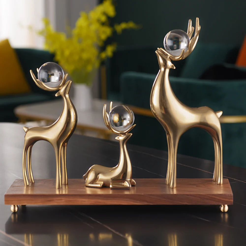 3-Piece Gold Resin Reindeer Sculpture Set – Christmas Deer Decor for Living Room