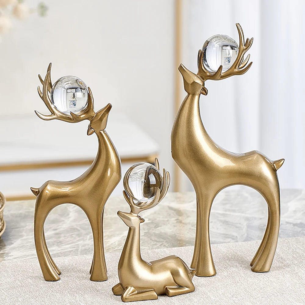 3-Piece Gold Resin Reindeer Sculpture Set – Christmas Deer Decor for Living Room